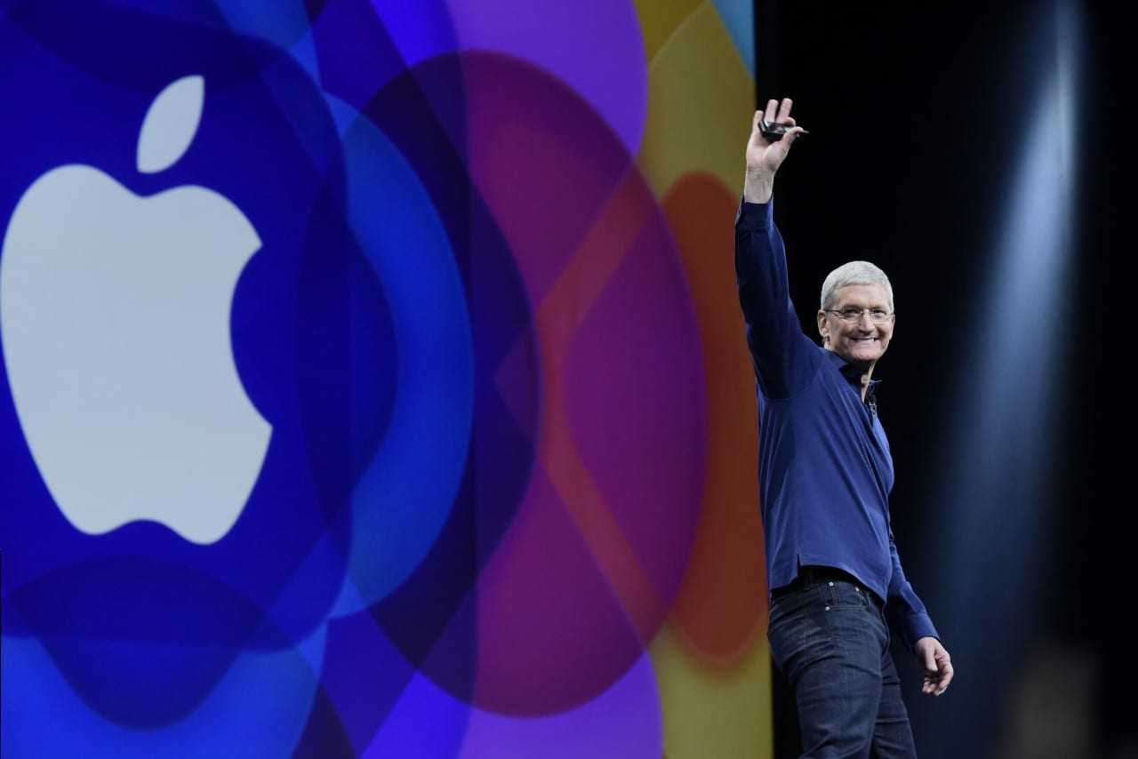 Tim Cook, chief executive officer of Apple Inc., waves before speaking during the Apple World Wide Developers Conference (WWDC) in San Francisco, California, U.S., on Monday, June 8, 2015. Apple Inc., the maker of iPhones and iPads, will introduce software improvements for its computer and mobile devices as well as reveal new updates, including the introduction of a revamped streaming music service. Photographer: David Paul Morris/Bloomberg *** Local Caption *** Tim Cook