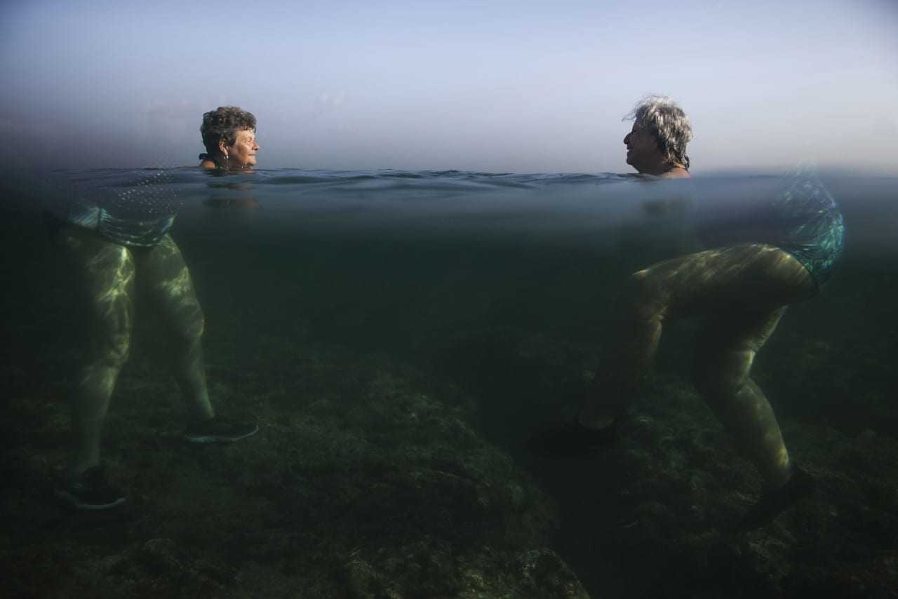 People swim at the sea in Havana, April 28, 2015. On Sunday, Cuba registered a temperature of 39.7 degrees Celsius, 0.1 degrees less than the island's historic record, according to Jose Rubiera, Director of the National Forecast Center of the Institute of Meteorology of Cuba.